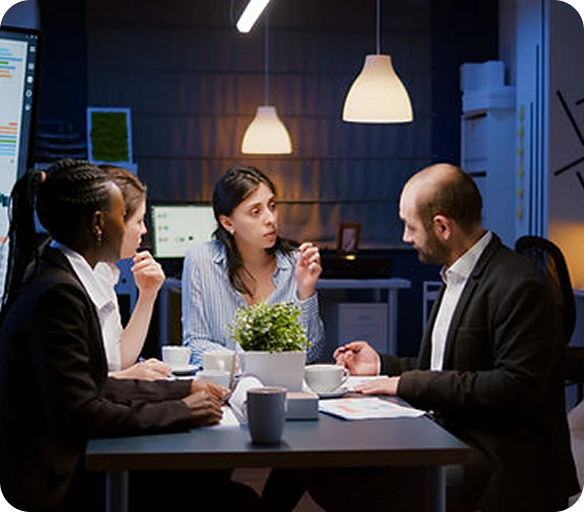 Team discussing project in modern office.